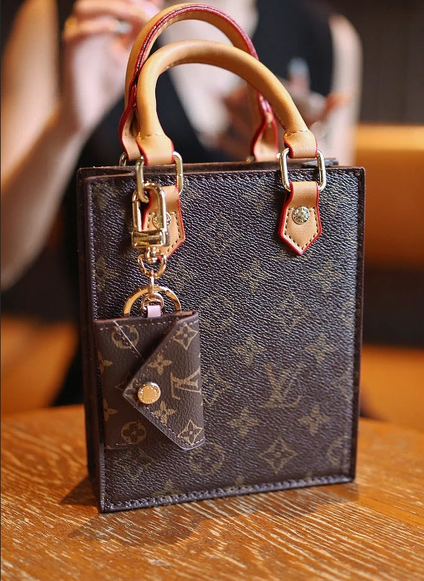 Keychain phone bag crafted by a celebrity designer - product view 1